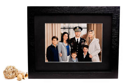 Congratulations to the Navy Officer on their promotion, beautifully documented by Northern Virginia family photographer Tamieka Smith and presented in a custom 3xm folio box. The exterior of the box features a timeless navy blue color with the officer's name and rank elegantly displayed. Inside, each image captures the officer's strength, dedication, and commitment to serving their country. From proud moments in uniform to joyful celebrations with family, this collection of images showcases the officer's journey and accomplishments. This folio box is a stunning display piece that honors their service and will be cherished for years to come.