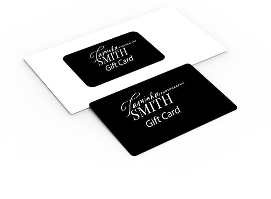 A gift card from a family photographer in Woodbridge VA, displayed against a soft, neutral background. The gift card is excellent for families needing family pictures to capture precious family moments and create lasting memories.