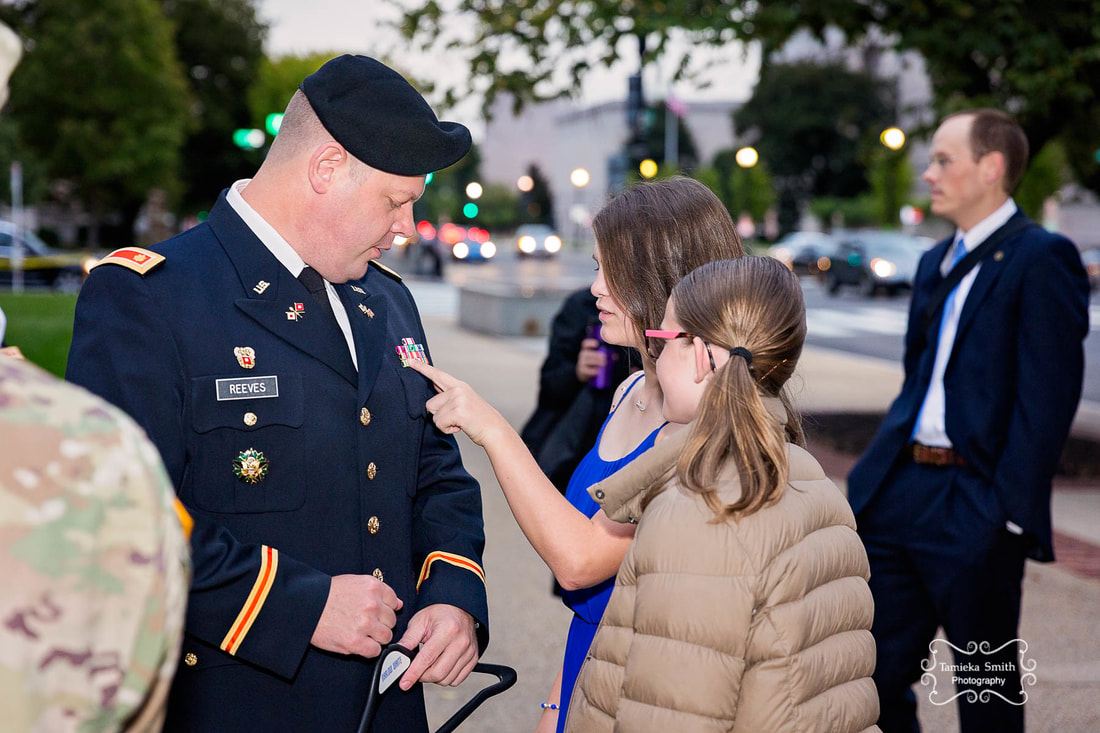 Dad showing military ribbons outside National Archives Museum