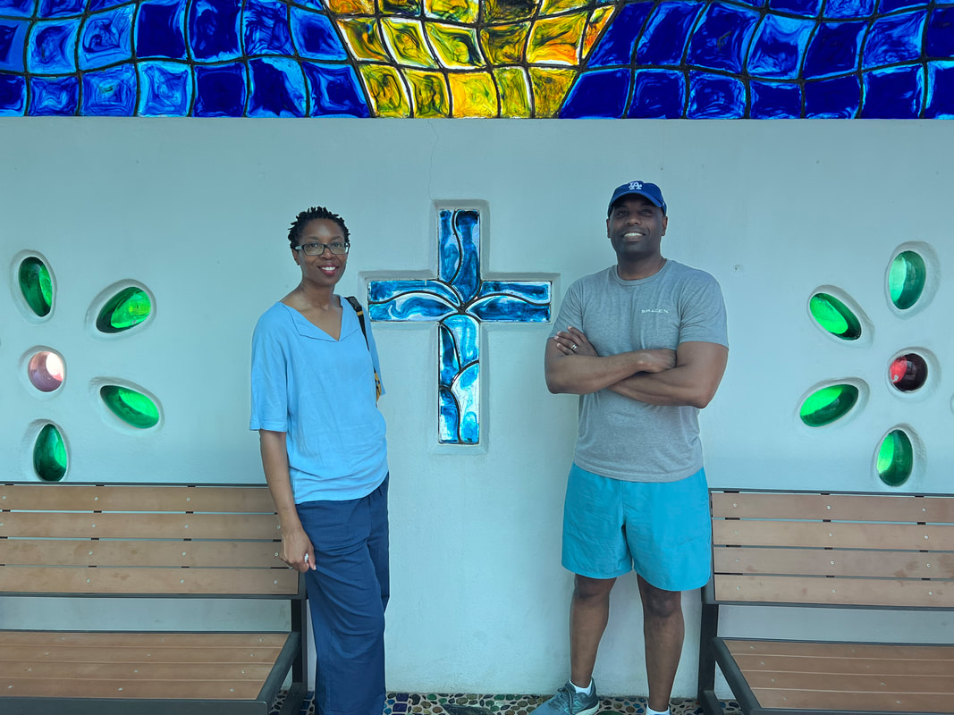 Tamieka Smith visits a glass blowing shop in Los Cabos Mexico for family vacation