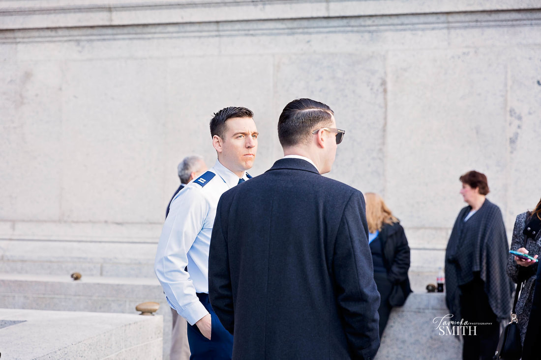 Air Force Officer talking to guests before his National Archives Ceremony