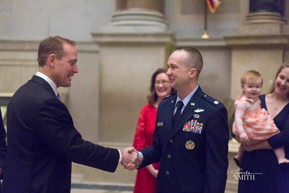 Air Force Officer shakes Congressman Ted Budd's hands, Air Force Promotion Ceremony, National Archives Photographer